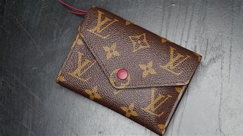 victorine wallet louis vuitton gold button|victorine wallet louis vuitton price.